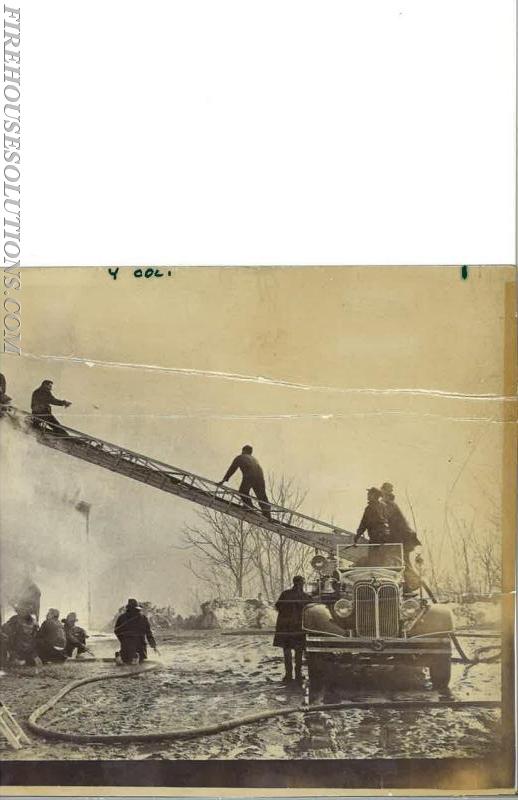 1938 Ladder truck working at Collins Storage
