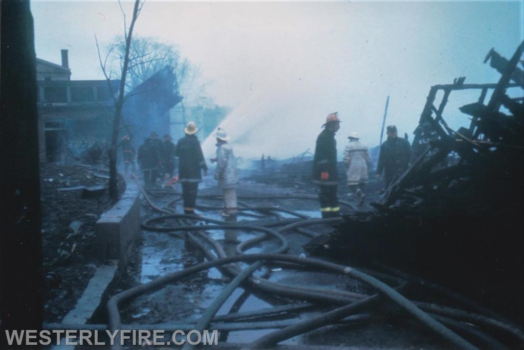Box 4535-November 7, 1977-Westerly  firefighters inspecting the remains.