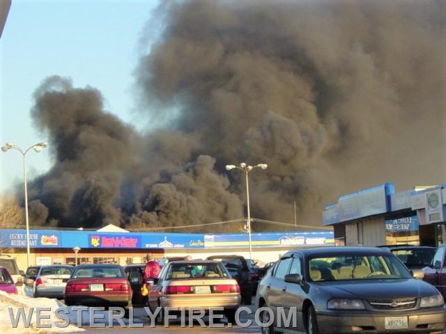 Box 1313-February 4, 2004-A view of the smoke from the Granite St. Shopping Center parking lot.