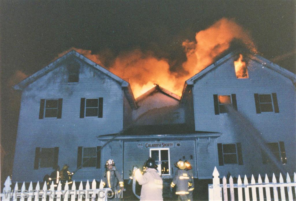 Boxes 4121 and 4115-May 9,1986-The front of the building as the fire takes complete control of the attic and roof.