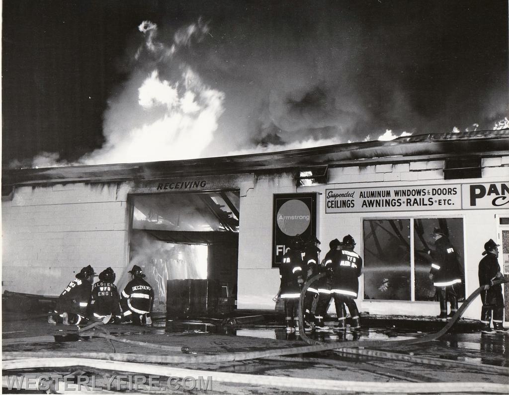 Box 4111-June 16, 1978-Vic Morgan & Sons Home Center 101 Canal St. Westerly firefighters attack the fire from multiple entry points.