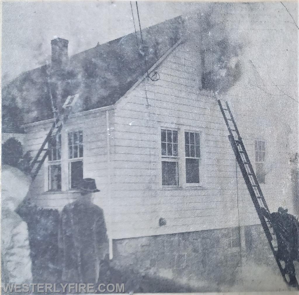 Box 4414-October 30, 1962- Heavy smoke billows from the second floor bedroom of the home on Ashaway Road near the bridge.