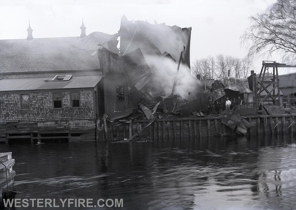 April 22,1903-Eaton Grist Mill- A view from the Pawcatuck side. The fire is believed to have started on the river side.